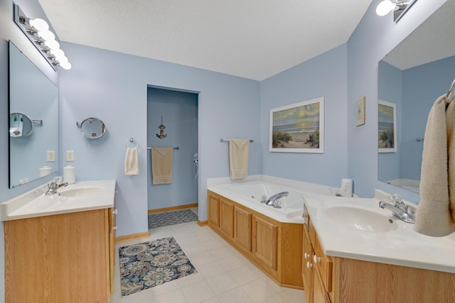 10777 181st Cir NW, Elk River, MN 55330 - full bathroom featuring vanity, a garden tub, and a textured ceiling