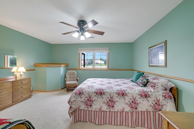 10777 181st Cir NW, Elk River, MN 55330 - carpeted bedroom featuring a textured ceiling and ceiling fan