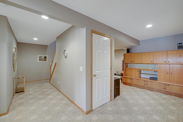 10777 181st Cir NW, Elk River, MN 55330 - hall with light colored carpet, recessed lighting, and stairway