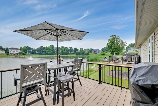 10777 181st Cir NW, Elk River, MN 55330 - wooden terrace with grilling area and a water view