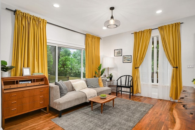 2916 26th St, Minneapolis, MN 55406 - living room featuring hardwood / wood-style flooring and recessed lighting
