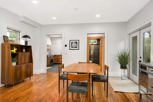 2916 26th St, Minneapolis, MN 55406 - dining space with dark wood-style flooring, recessed lighting, baseboards, and french doors