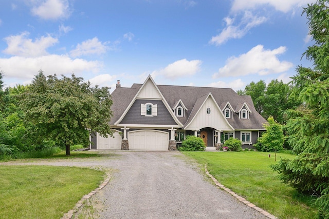 1755 Chateau Way, Minnetrista, MN 55359 - shingle-style home featuring gravel driveway, a front lawn, an attached garage, stone siding, and a chimney