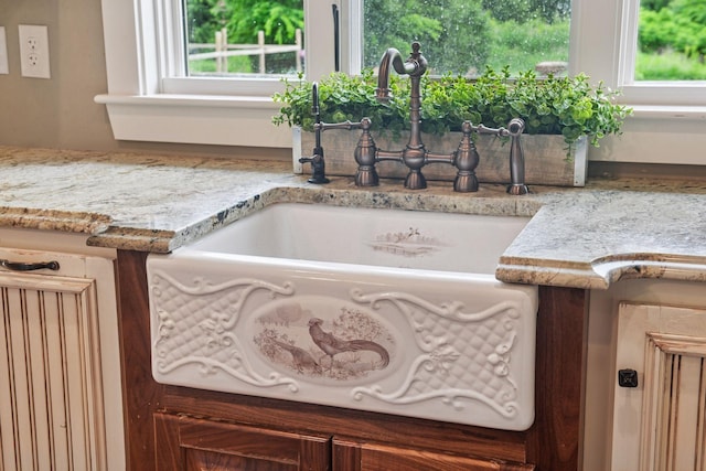 1755 Chateau Way, Minnetrista, MN 55359 - kitchen view of a sink and light stone counters