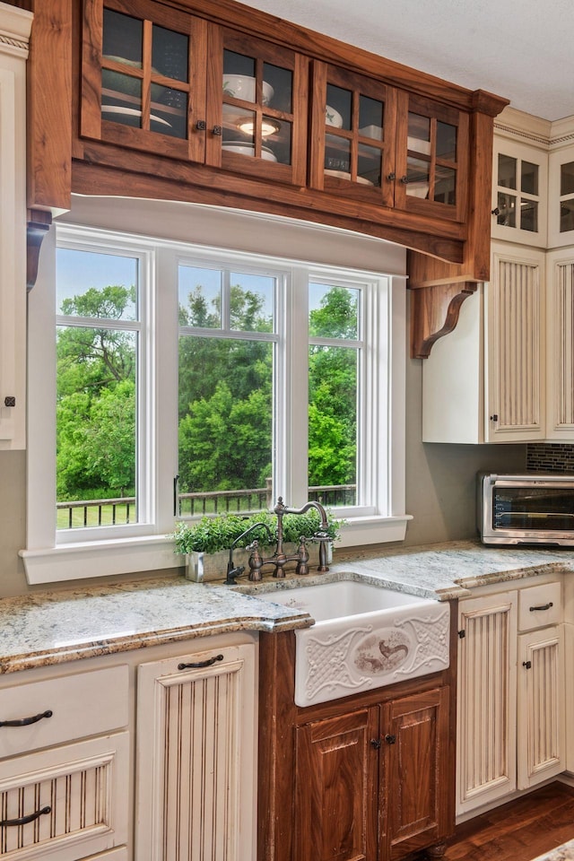 1755 Chateau Way, Minnetrista, MN 55359 - kitchen with glass insert cabinets and light stone countertops