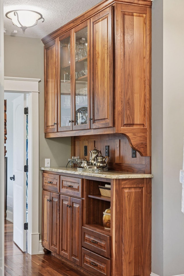 1755 Chateau Way, Minnetrista, MN 55359 - bar area featuring dark wood finished floors and a textured ceiling