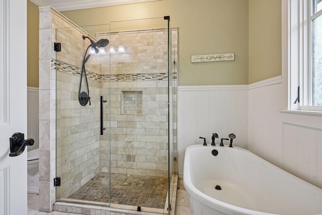 1755 Chateau Way, Minnetrista, MN 55359 - bathroom featuring a wainscoted wall, a stall shower, and a soaking tub