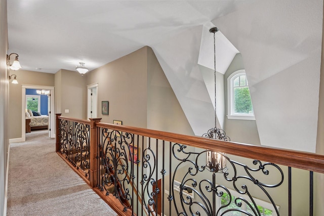 1755 Chateau Way, Minnetrista, MN 55359 - corridor featuring a chandelier, carpet flooring, and lofted ceiling