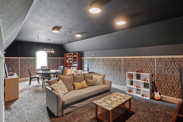 1755 Chateau Way, Minnetrista, MN 55359 - living area with wallpapered walls, carpet flooring, lofted ceiling, a textured ceiling, and wainscoting
