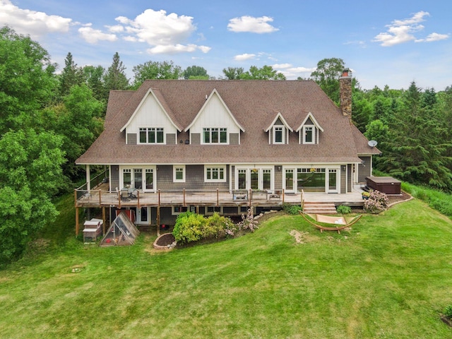 1755 Chateau Way, Minnetrista, MN 55359 - rear view of property featuring a hot tub, a yard, a deck, and a chimney