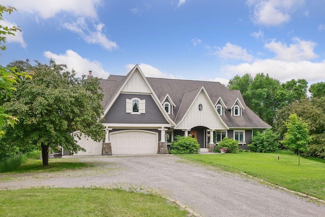 1755 Chateau Way, Minnetrista, MN 55359 - shingle-style home featuring gravel driveway, a front lawn, stone siding, board and batten siding, and a shingled roof