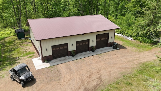 43190 Government Rd, Hinckley, MN 55037 - detached garage with a view of trees and dirt driveway