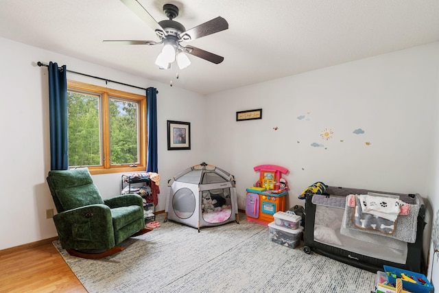 43190 Government Rd, Hinckley, MN 55037 - rec room featuring a ceiling fan and wood finished floors