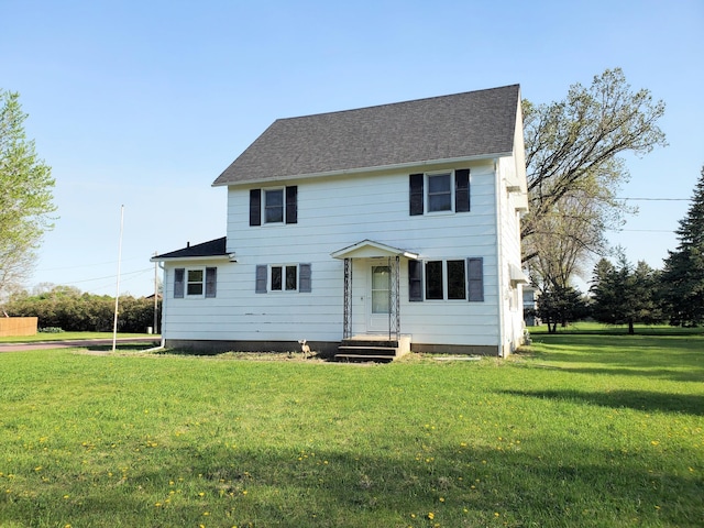 801 Greenwood Ave, Tracy, MN 56175 - colonial home with a front lawn and roof with shingles