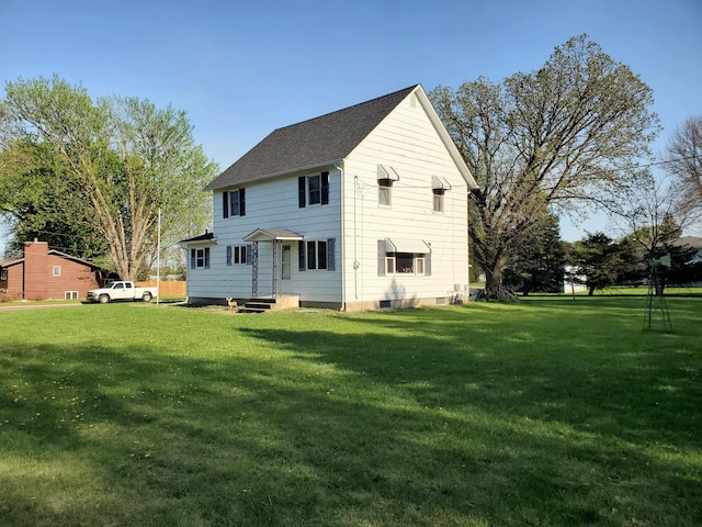 801 Greenwood Ave, Tracy, MN 56175 - rear view of house featuring entry steps and a yard