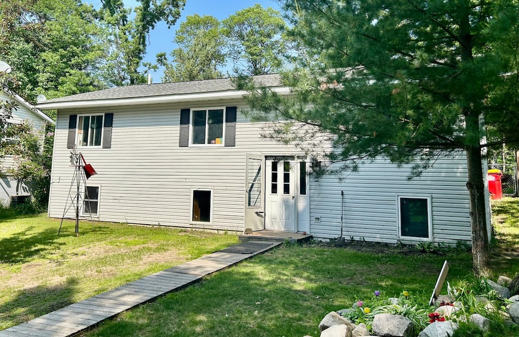 30400 Spruce Dr, Breezy Point, MN 56472 - back of property with a lawn