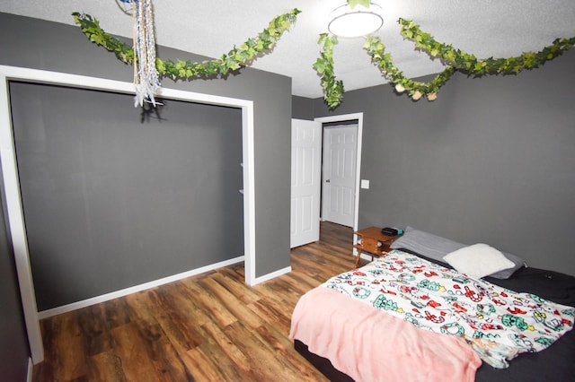 30400 Spruce Dr, Breezy Point, MN 56472 - bedroom with wood finished floors and a closet