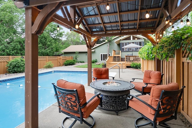 8409 Knollwood Dr, Mounds View, MN 55112 - view of patio with a fire pit and a gazebo
