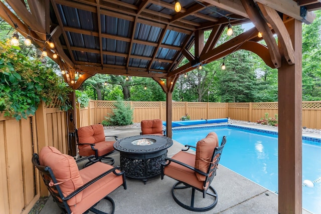 8409 Knollwood Dr, Mounds View, MN 55112 - view of pool with a fire pit, a fenced backyard, and a patio