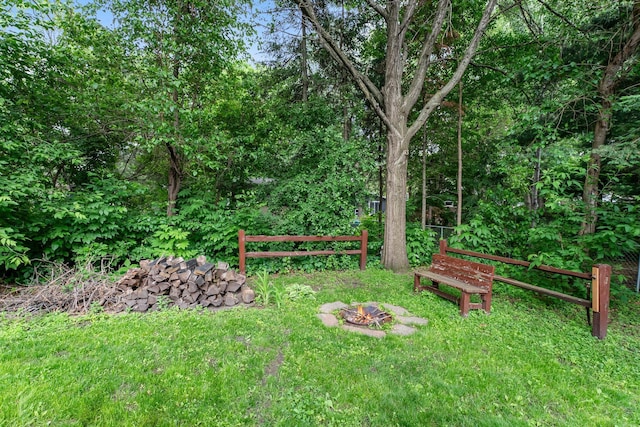 8409 Knollwood Dr, Mounds View, MN 55112 - view of yard featuring a fire pit