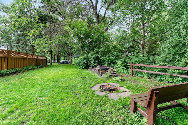 8409 Knollwood Dr, Mounds View, MN 55112 - view of yard with a fire pit