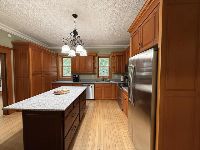 78994 160th St, Sacred Heart, MN 56285 - kitchen featuring stainless steel appliances, a sink, open shelves, a chandelier, and a center island