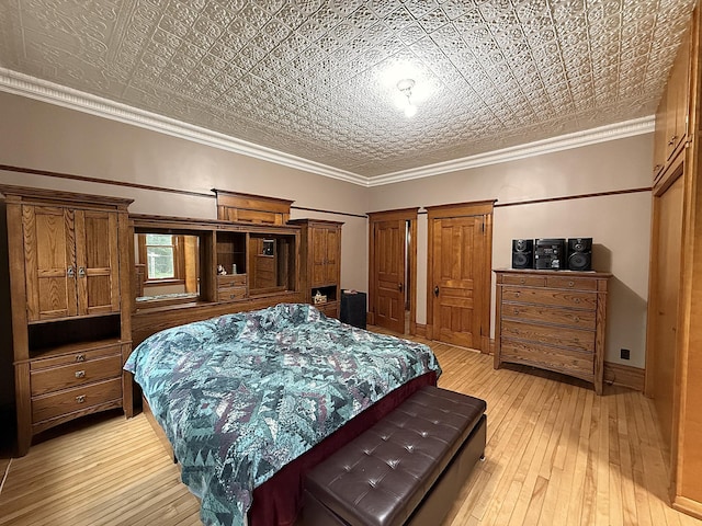 78994 160th St, Sacred Heart, MN 56285 - bedroom featuring light wood finished floors, an ornate ceiling, and two closets