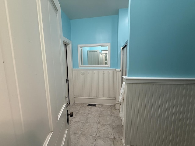 78994 160th St, Sacred Heart, MN 56285 - bathroom with a wainscoted wall and tile patterned flooring