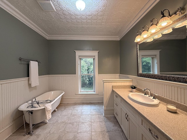 78994 160th St, Sacred Heart, MN 56285 - bathroom with a freestanding tub, wainscoting, and vanity
