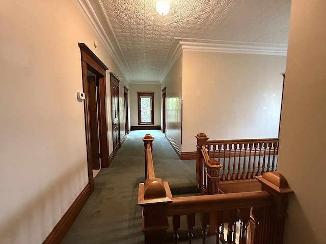 78994 160th St, Sacred Heart, MN 56285 - hallway with baseboards, dark colored carpet, and crown molding