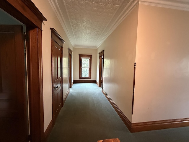 78994 160th St, Sacred Heart, MN 56285 - hallway with dark colored carpet, baseboards, and crown molding