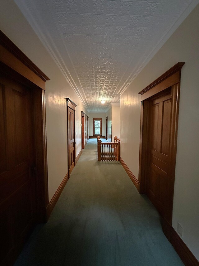 78994 160th St, Sacred Heart, MN 56285 - hall with light carpet, a textured ceiling, baseboards, crown molding, and an upstairs landing