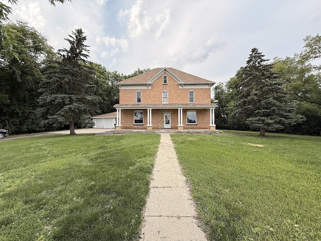 78994 160th St, Sacred Heart, MN 56285 - view of front of home with a front lawn, brick siding, and covered porch