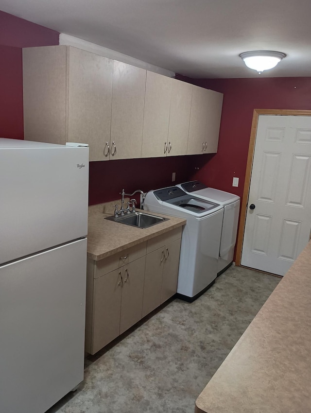 78994 160th St, Sacred Heart, MN 56285 - laundry room featuring washing machine and dryer, cabinet space, and light floors