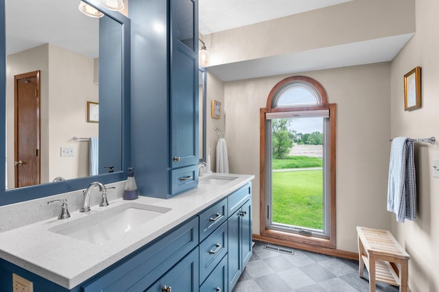 4540 Niagara Ln N, Plymouth, MN 55446 - bathroom with double vanity and baseboards