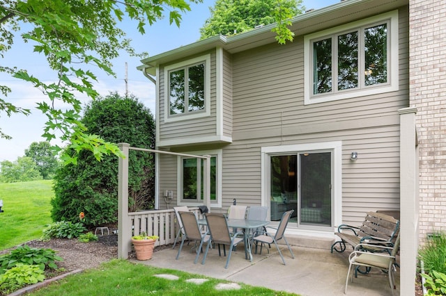 4540 Niagara Ln N, Plymouth, MN 55446 - back of property with a patio and a lawn