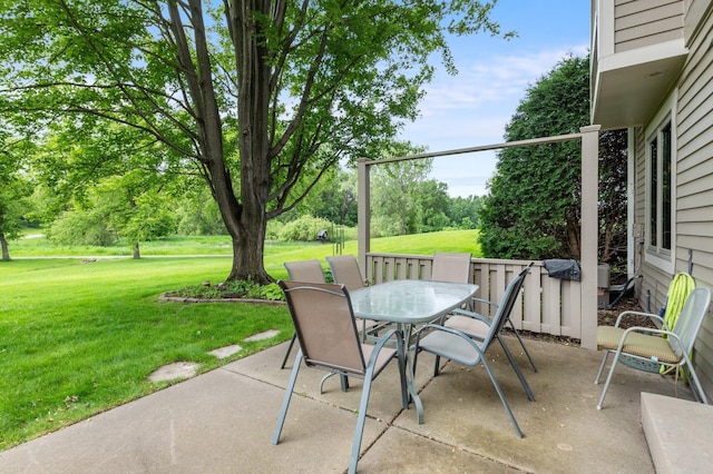 4540 Niagara Ln N, Plymouth, MN 55446 - view of patio / terrace with outdoor dining area and view of scattered trees