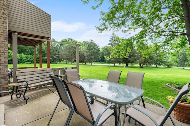 4540 Niagara Ln N, Plymouth, MN 55446 - view of patio / terrace featuring outdoor dining area and view of wooded area