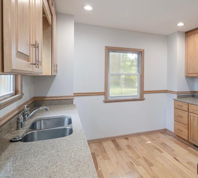 1368 Dale St N, Saint Paul, MN 55117 - kitchen with light wood-type flooring, recessed lighting, light countertops, and light brown cabinets
