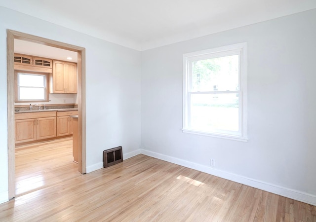 1368 Dale St N, Saint Paul, MN 55117 - unfurnished room featuring light wood finished floors