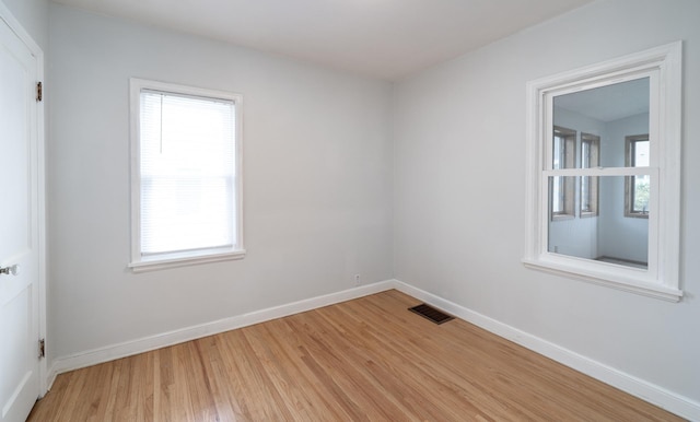 1368 Dale St N, Saint Paul, MN 55117 - spare room featuring light wood-type flooring and baseboards