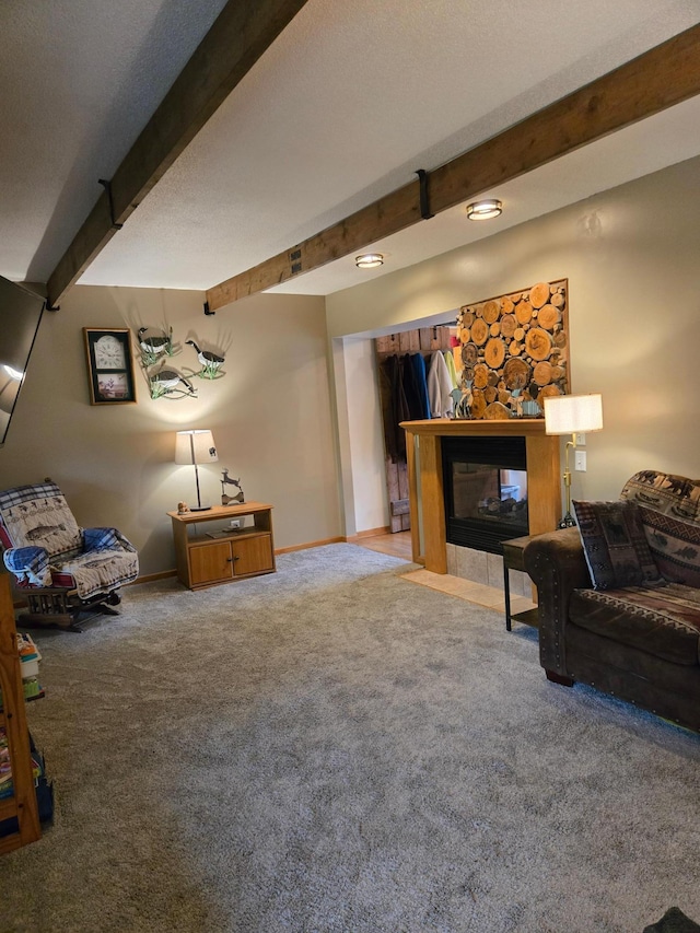 44416 Georgia Ave, Harris, MN 55032 - living area with carpet flooring, beamed ceiling, and a stone fireplace