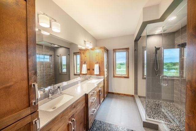 29437 141st Ave, Lanesburgh Twp, MN 56071 - bathroom featuring double vanity, baseboards, a shower stall, and tile patterned flooring