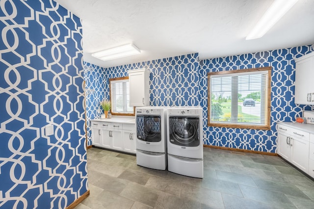 29437 141st Ave, Lanesburgh Twp, MN 56071 - laundry room with wallpapered walls, independent washer and dryer, baseboards, and cabinet space