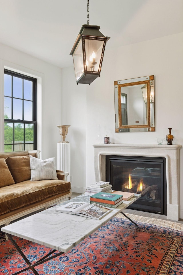 2176 153rd Ave, Mora, MN 55051 - living room featuring a glass covered fireplace and baseboards