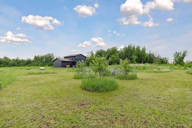 2176 153rd Ave, Mora, MN 55051 - view of grassy yard featuring a view of countryside and an outdoor structure