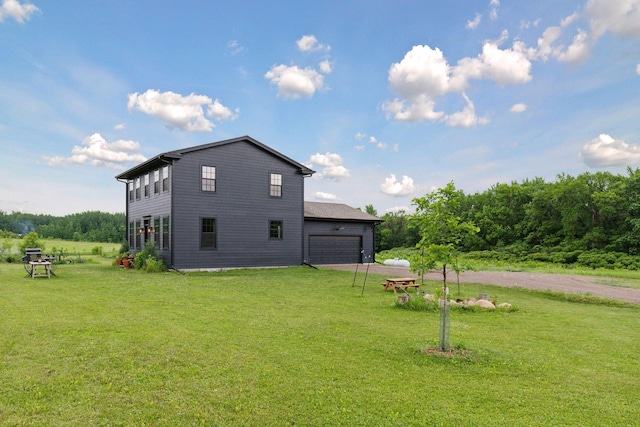 2176 153rd Ave, Mora, MN 55051 - view of side of home with driveway and a yard
