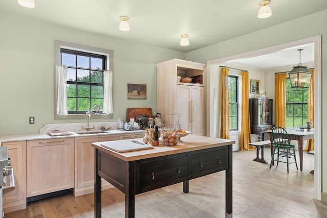 2176 153rd Ave, Mora, MN 55051 - kitchen featuring light countertops, light wood-type flooring, light brown cabinetry, and paneled built in fridge