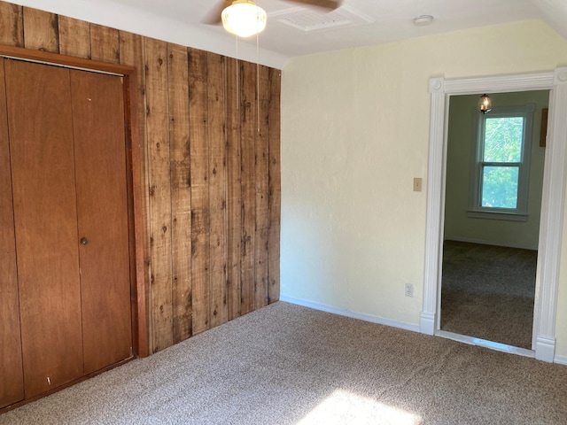 643 Miller Ave, Windom, MN 56101 - unfurnished bedroom featuring carpet floors, a closet, and a ceiling fan