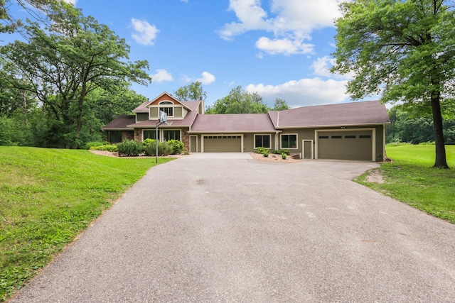 11960 Albavar Path, Inver Grove Heights, MN 55077 - view of front facade featuring an attached garage, asphalt driveway, and a front yard